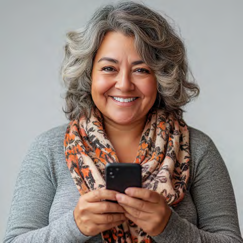 Person with a phone and colorful scarf, representing approachability